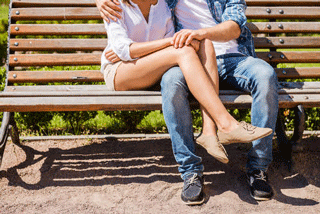 Woman and man on bench, Are You Dating A Player DDM Matchmaker blog